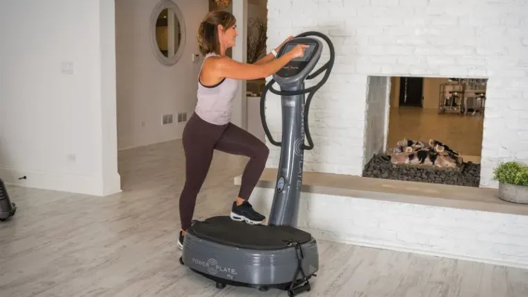 Oscillating and lineal vibration plates compared side by side on a wood floor