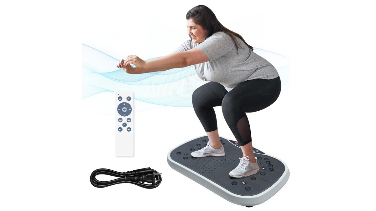 Under desk vibration plate sits beneath a modern home office desk