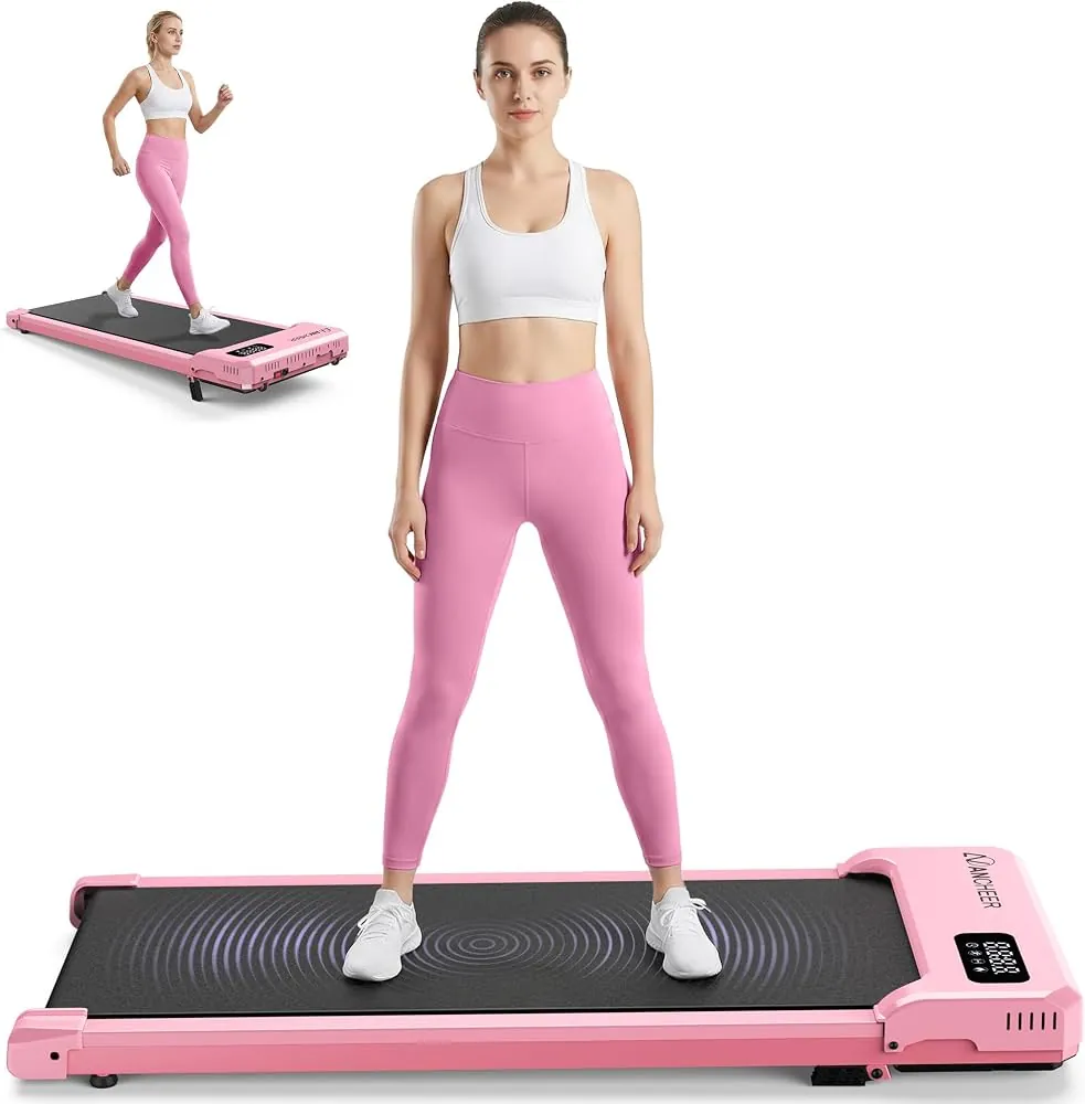 Vibration plate with laptop and plant on a light wood floor