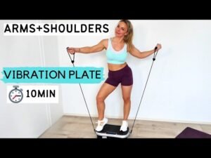 Vibration plate with resistance bands in a bright home gym