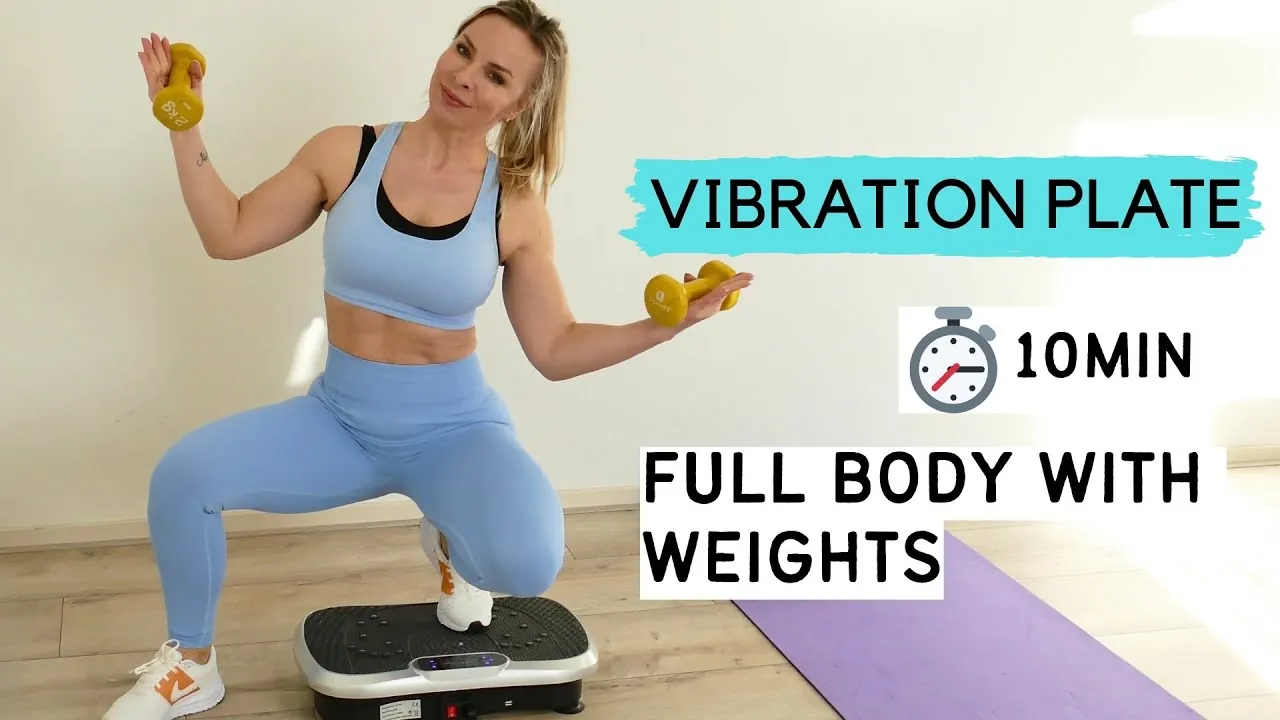 Vibration plate with weights and dumbbells arranged on a home gym floor