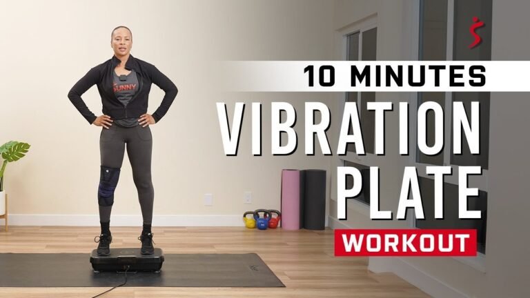 Woman balancing on a vibration plate during a ten minute workout at home
