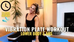 Woman doing a vibration plate workout in a bright living room